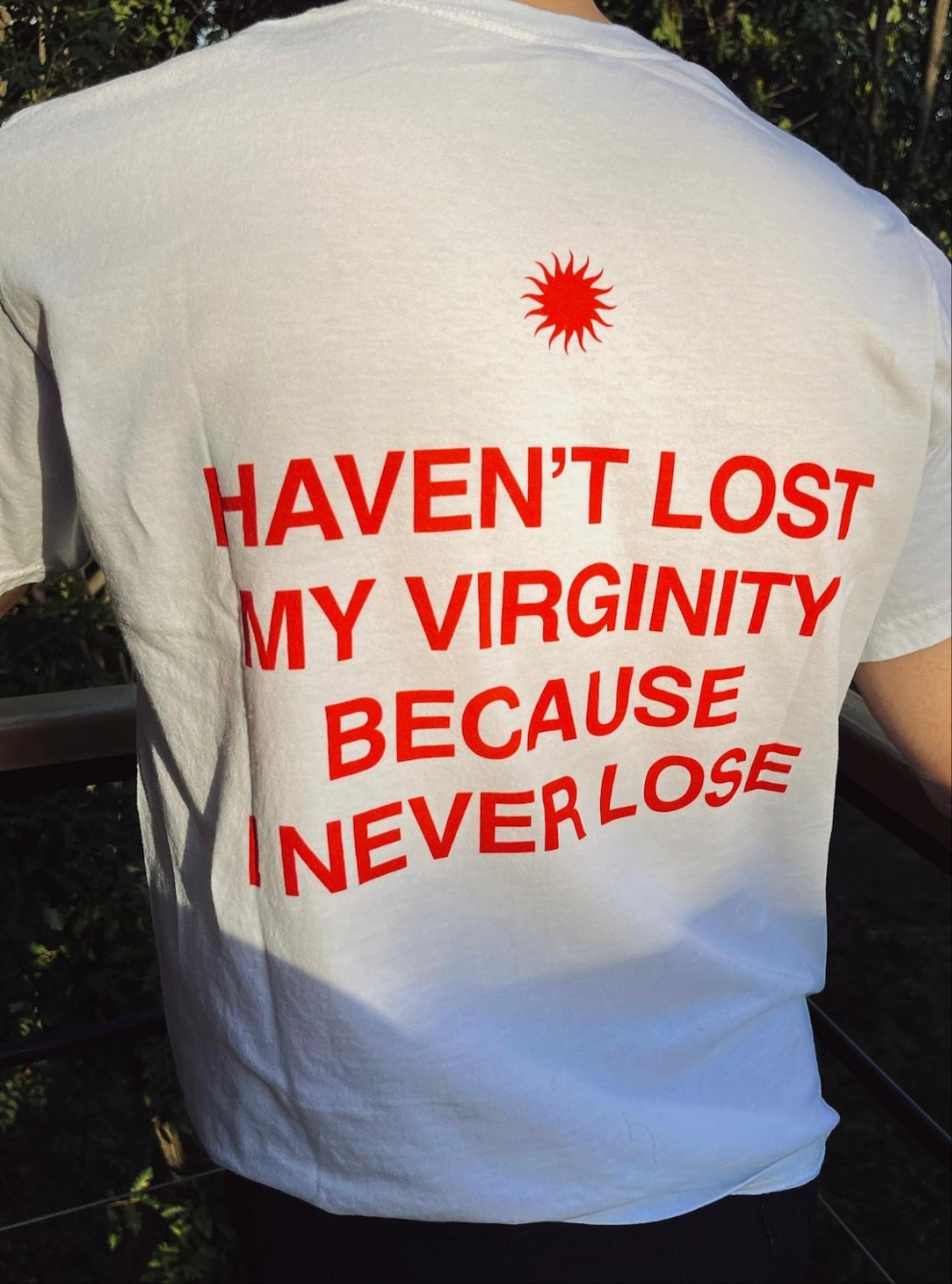 Women’s Bold Graphic Tee – "Haven’t Lost My Virginity Because I Never Lose"