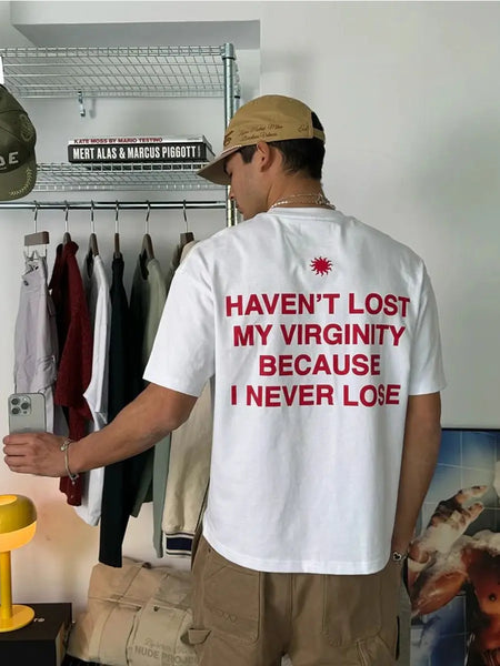 Funny Men’s White Graphic T-Shirt – “Haven’t Lost My Virginity Because I Never Lose” Statement Tee