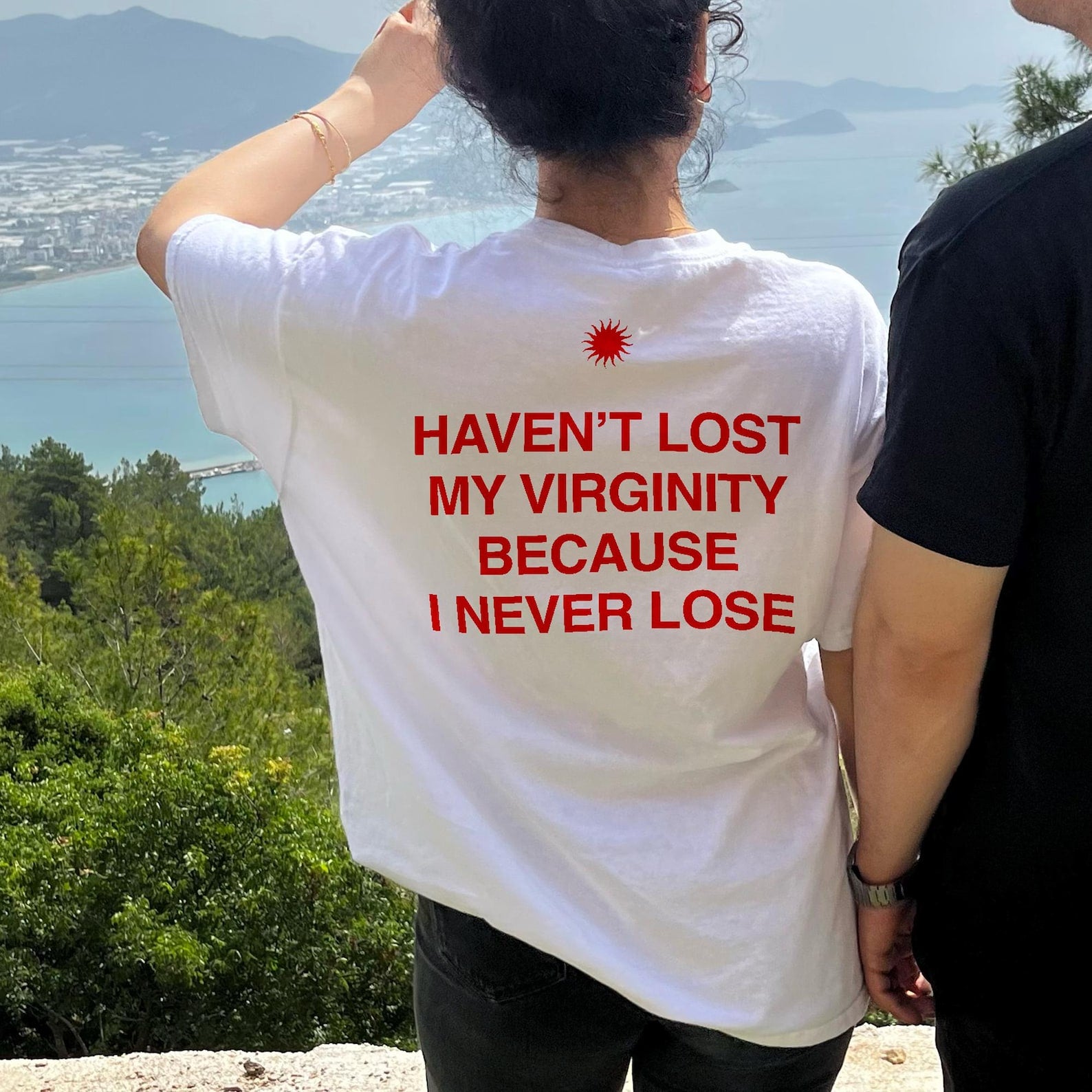 Women’s Bold Graphic Tee – "Haven’t Lost My Virginity Because I Never Lose"